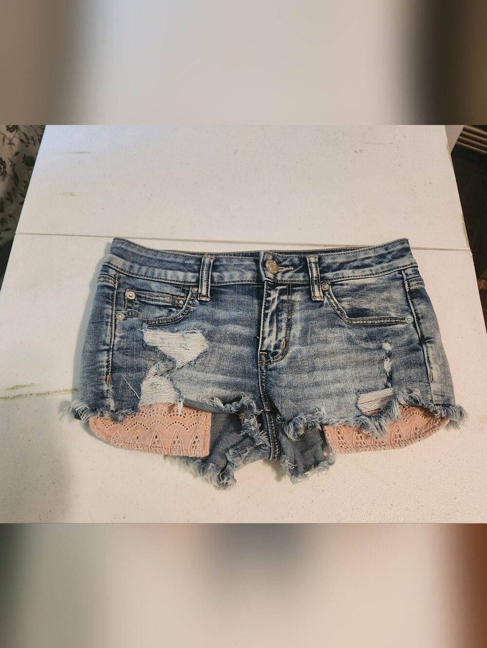 American Eagle Outfitters Light Blue Distressed Denim Shorts with Pink Lace